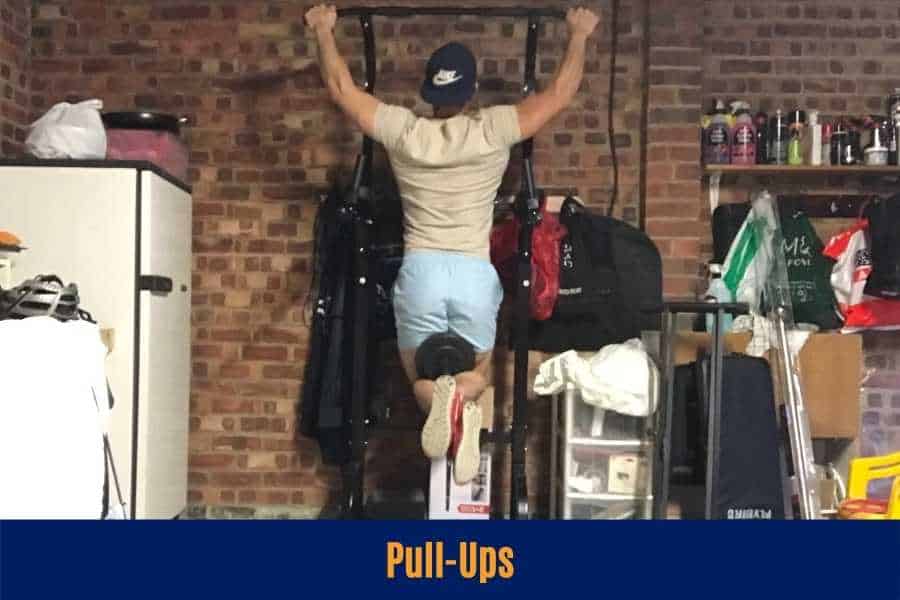 How to do the weighted pull-up to build a v-shaped body with dumbbells.