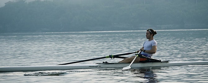 Man Rowing On A Single Seater Row Beat