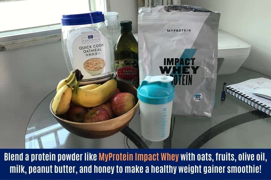 Make a healthy homemade weight gainer shake by blending protein powder with fruits, olive oil, peanut butter, oats, milk, and honey.