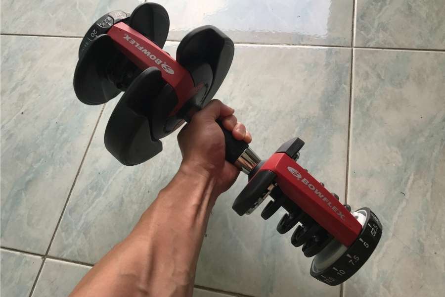 How to offset the weight in a Bowflex dumbbell.