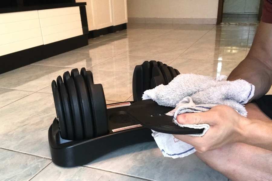 How to wipe the Bowflex weight plates using a microfibre cloth.