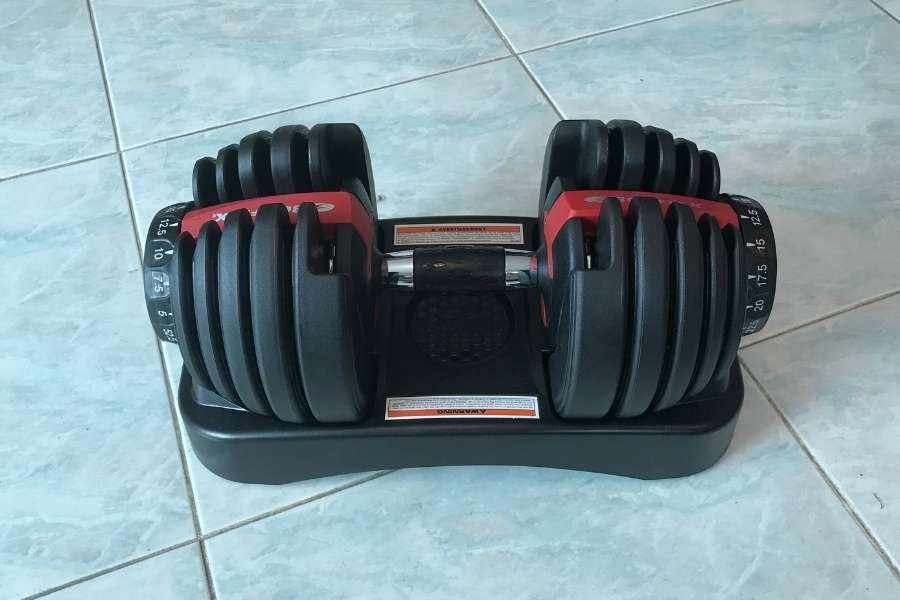 The Bowflex 552 adjustable dumbbell I own sat in the base.