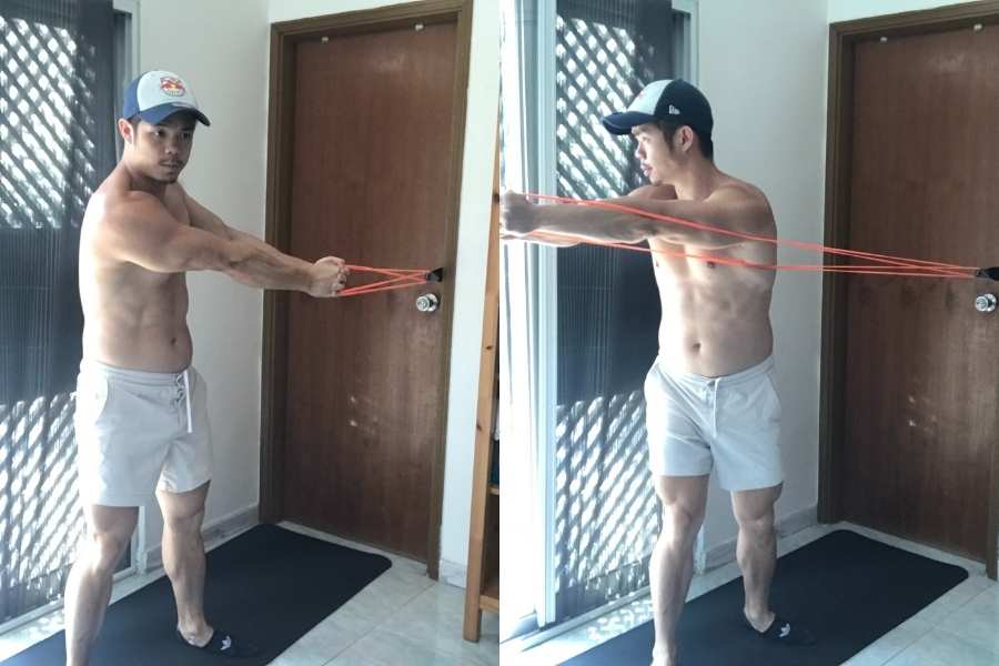 Picture of how to perform core rotations with a resistance band.